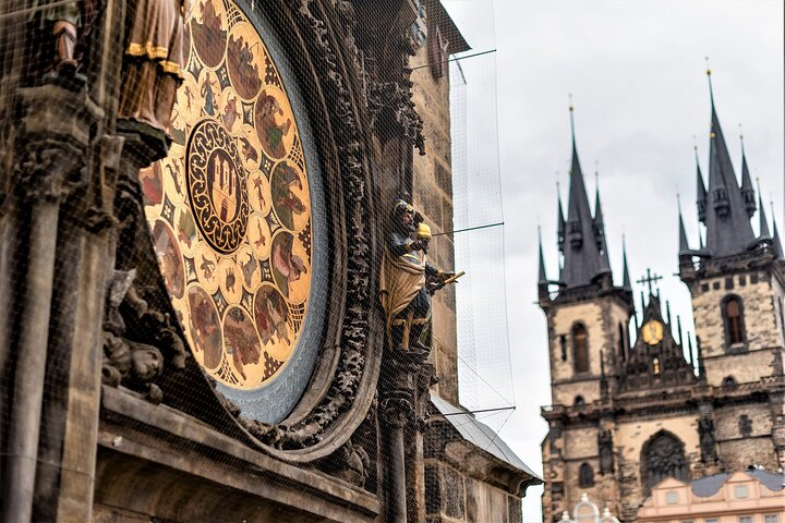Experience the charm of Prague's Astronomical Clock Tower where intricate designs and rich history come alive. Witness the iconic clock's figures in motion revealing centuries of craftsmanship and tradition.